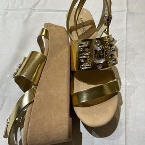 Michael Kors women metallic  gold platform sandals.